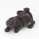 Netsuke of a Snake on a Lion 1-1/8" x 1-3/4"Carved and lacquered netsuke of a snake wrapping