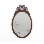 Mahogany Oval Mirror, English, ca. 1780-90 28" x 16-1/4"George III period oval mirror with pierced