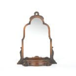 Gentlemen's Shaving Mirror 30-1/4" x 23-1/4"Featuring a serpentine drawer with a hinged lid below.