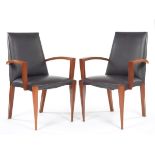 Pair of Dakota Jackson Kezu Leather Armchairs 36-1/2" x 24-1/2" x 27"Two open-arm side chairs in