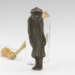 Metal Figural Netsuke 2-1/2"Metal netsuke of a man. Unsigned. Online Bidding and additional