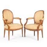 A Pair of French Style Upholstered Arm Chairs 35-1/4" x 25-1/2" x 21"A pair of arm chairs