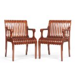 A Pair of Wooden Slatted Arm Chairs 33-1/8" x 22" x 23"Two contemporary, vertically slatted arm