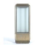 Art Deco Display Case 69-1/2" x 28" x 10"Nickel over steel, trapezoidal in shape with a beveled