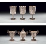 OTTOMAN SILVER DESSERT SET Ottoman, one dessert bowl, two spoon warmers, and three pieces of