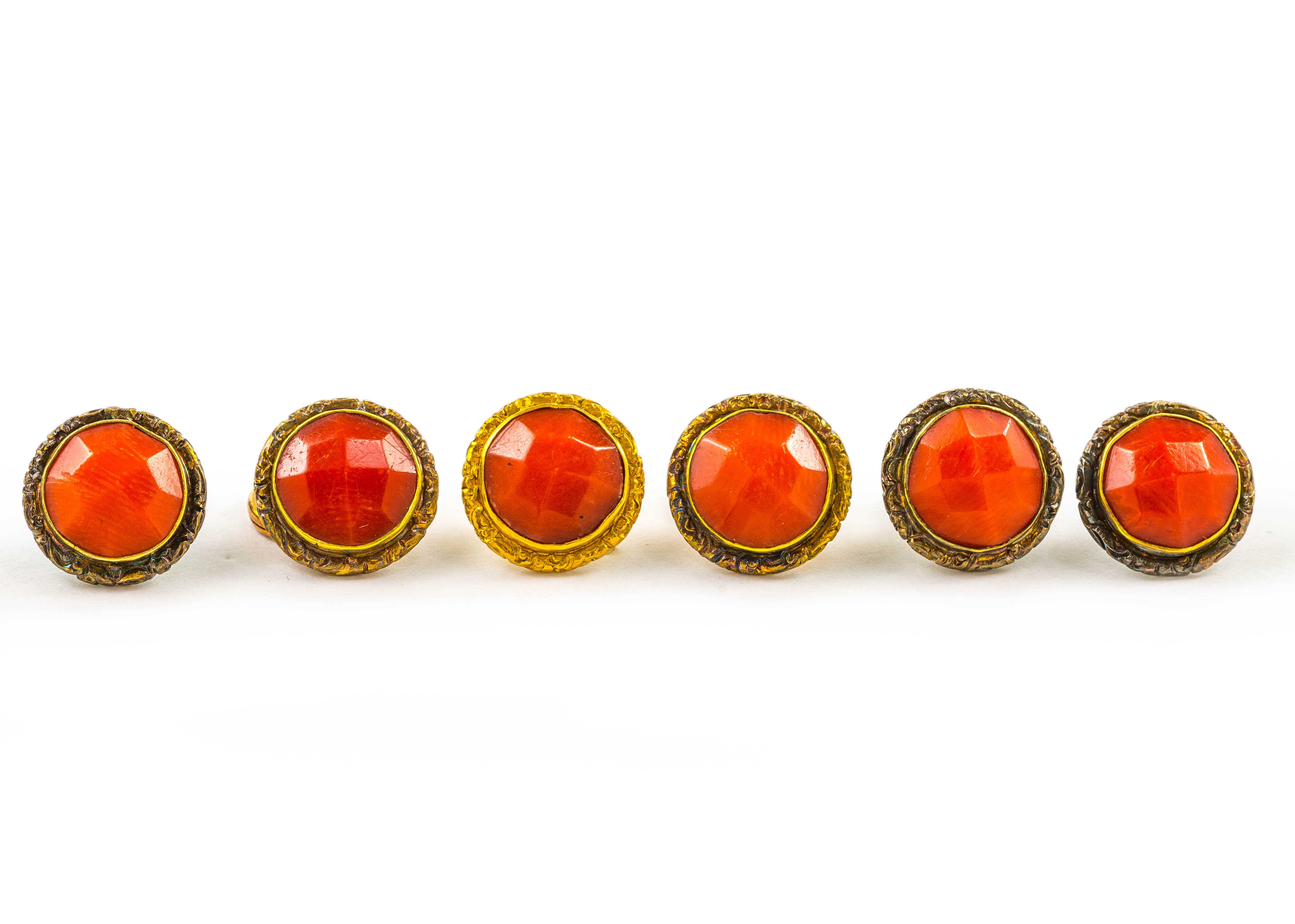 A set of antique Mediterranean coral and yellow metal buttons, in original fitted case, button