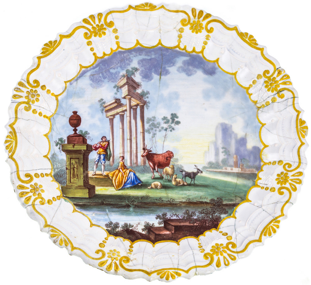 An extremely rare 18th century Battersea enamel plate, 18 cm diameter.