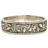 An antique silver bangle, width 6.4cm, Wt. 31.2g.