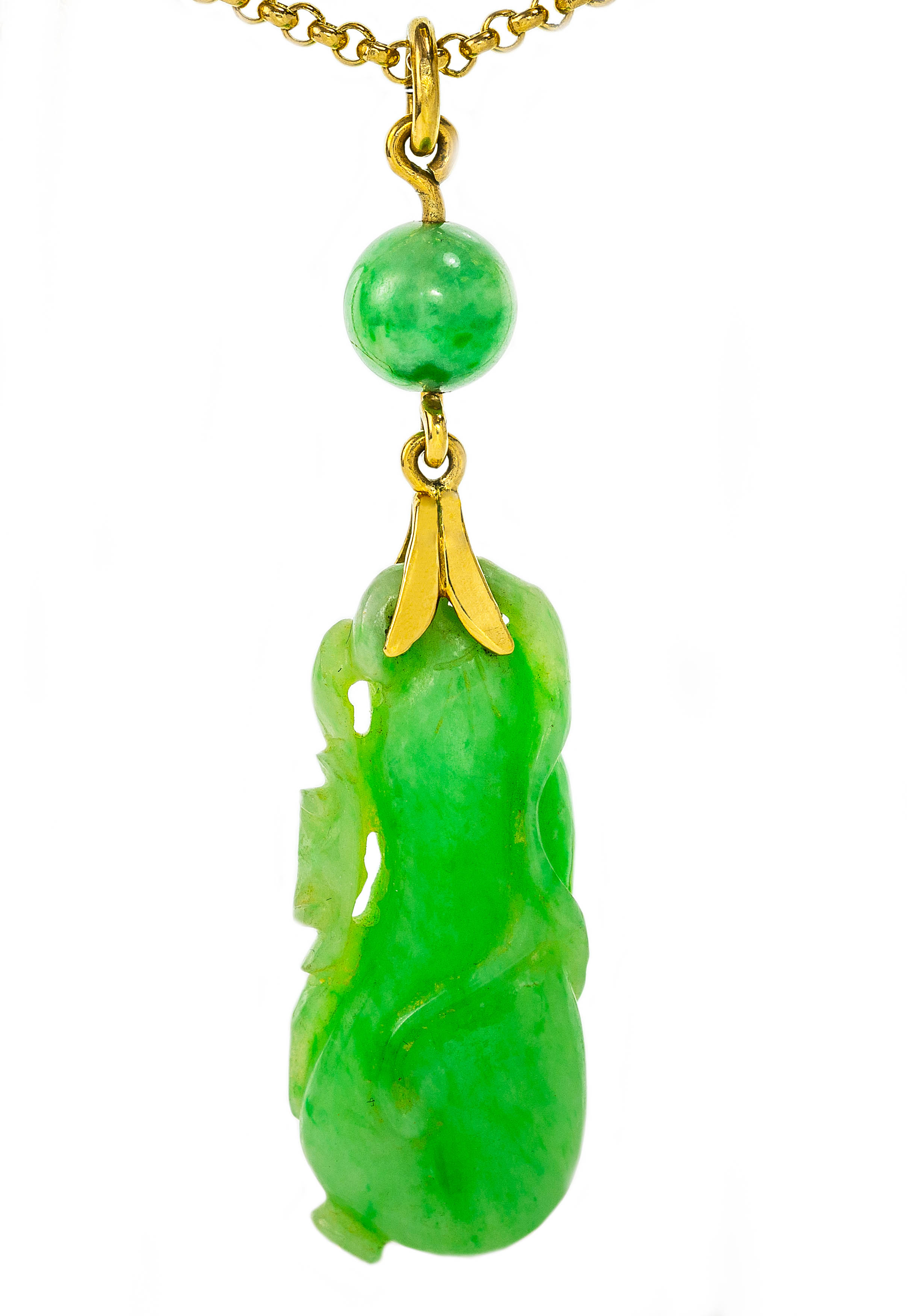 A gold and jadeite pendant on gold chain, pendant length 5.5cm width 1.5cm, chain length 36cm. Total