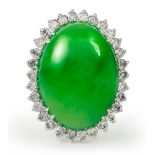 A platinum, certificated no treatment jadeite and diamond ring, jade measures 20.2 x 15.1 x 5.4mm,