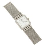 An Art Deco Cartier square platinum watch, the dial marked Cartier, bezel set with circular-cut