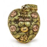 An antique three colour gold locket, size 2.5cm x 2.4cm, Wt. 15.9g.