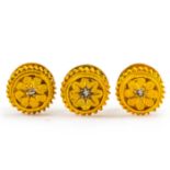 A set of three gold and diamond set cufflinks. Wt. 2.3g, width of cufflinks 8mm. (A.F)