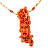 An antique gold, carved Mediterranean coral, sapphire and diamond necklace, pendant length 8.5cm,