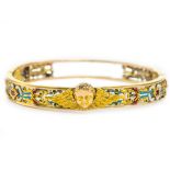 An antique gold ruby and enamel bangle, width 6.3cm Wt. 25.5g