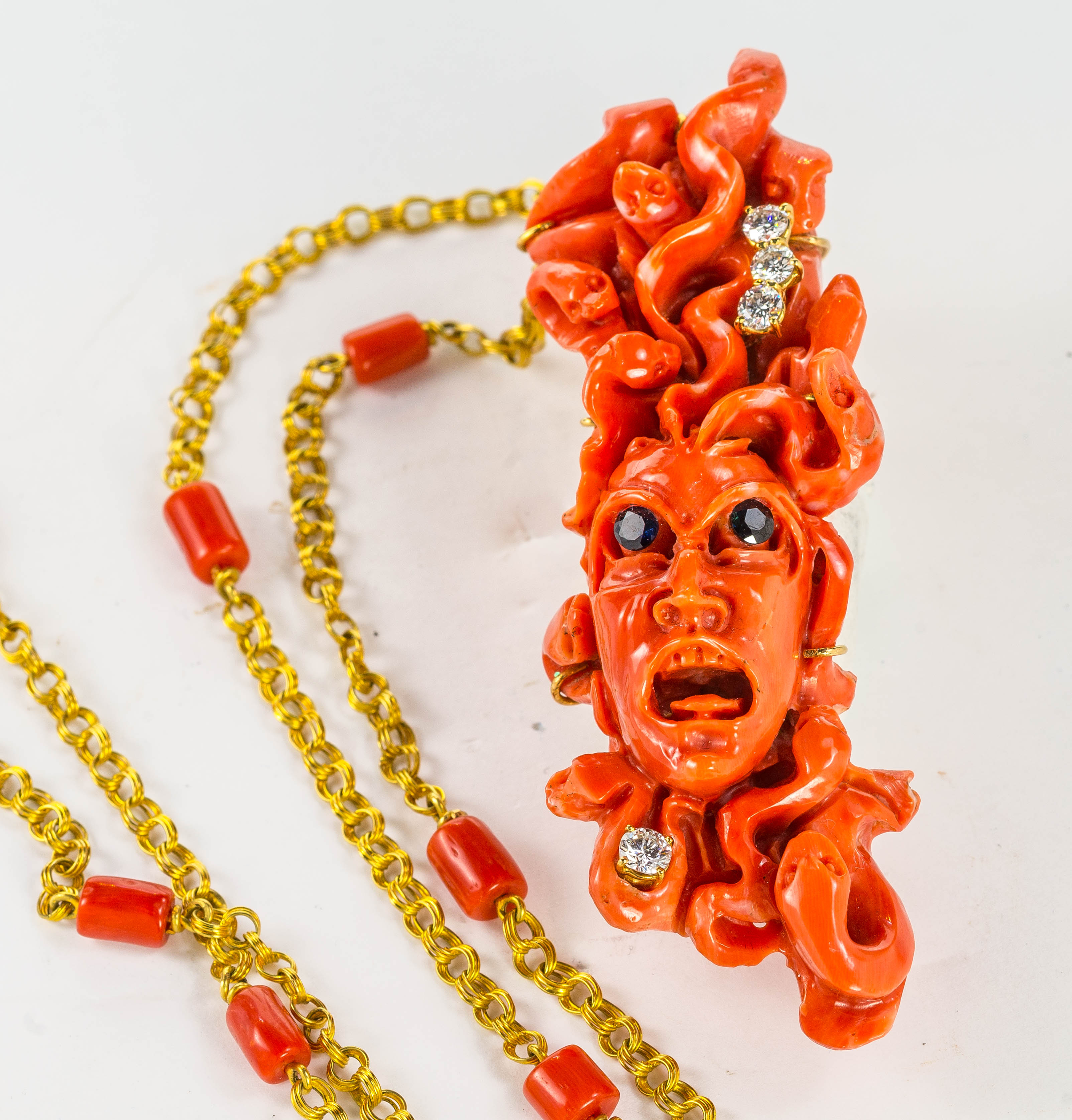 An antique gold, carved Mediterranean coral, sapphire and diamond necklace, pendant length 8.5cm, - Image 2 of 2