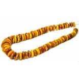 A natural Baltic amber necklace, amber size from 36mm x 8mm to 17mm x 8mm length 59cm Wt. 185.7g