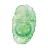 An exceedingly fine certificated icy jadeite Buddha pendant. 36.39mm x 21.11mm x 7.31mm. Wt. 9 g.