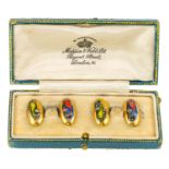 A pair of 18cts gold and enamel cufflinks, Chester hallmarks, maker S.B.&SLd, length 2cm, weight