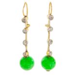 A pair of jadeite and diamond earrings, circa 1930. Length 8mm. Est. Dia. Wt. 0.40ct, approx 3.5cm