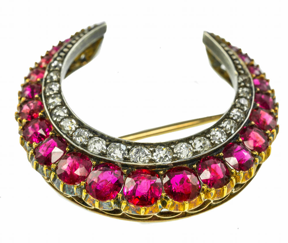 A Victorian ruby and diamond crescent brooch, Est. Ruby Wt. 1.75ct size 3cm x 2.8cm.