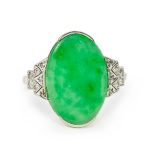 An art deco 18ct gold jade and diamond ring. Wt. 3.7g, jade 18mm x 11mm, ring size O.