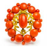 An antique gold, Mediterranean coral and pearl brooch. Size 4cm x 3.5cm Wt. 11.5g.