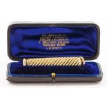 An antique gold pen, length when closed 6.2cm, when open 15.8cm, in a fitted case. Wt. 29.5g.