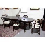 A Large Extending Mahogany Dining Table on Castors
