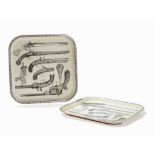 Fornasetti, In Style of, 2 Trays with Pistol Decor, 1950s  Metal with printed décor  Italy, 1950/60s