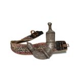 Magnificient Khandschar Dagger with Belt, Oman, 19th Century  Silver plated brass, silver, horn,