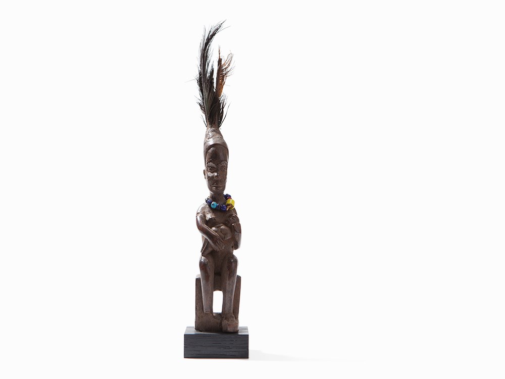 Bambata ‚Nkishi‘ Fetish Figure, Madimba, Bas Zaire, Mid-20th C.  Wood, feathers, glass bead necklace