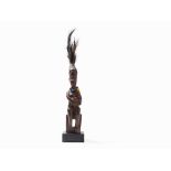 Bambata ‚Nkishi‘ Fetish Figure, Madimba, Bas Zaire, Mid-20th C.  Wood, feathers, glass bead necklace