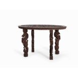 Oval Wood Table with Figural Carvings, India, c. 1940  Carved wood, bone  India, circa 1940  Fine