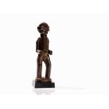 Chokwe, Standing Male Figure, Angola  Wood Chokwe peoples, Angola Depicting ‘Chibinda Ilunga’, a