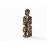 Fon, Important Seated Fetish Figure, Benin  Wood Fon peoples, Benin Male figure sitting on a stool