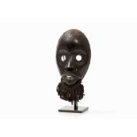 Dan, Face Mask, Ivory Coast, Early 20th C.  Wood, fiber  Dan peoples, Ivory Coast, early 20th