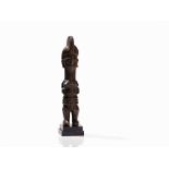 Ibibio, Female Figure, Nigeria  Wood Ibibio peoples, Nigeria Cylindrical body on simple slightly