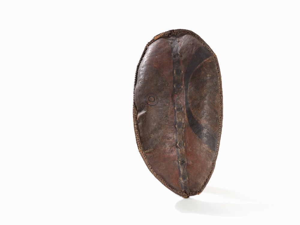 Masai, Warrior’s Shield, Kenya, Early 20th C.  Buffalo hide, wood, rattan, leather, pigment Masai