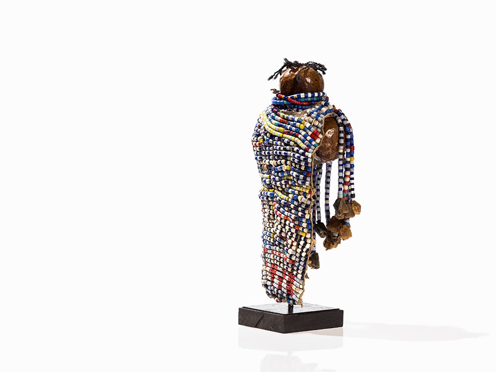 Turkana, Doll ‘Ngide’, Kenya  Palm nut, leather, beads, hair Turkana peoples, Kenya Abstracted - Image 4 of 10