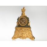 French Figural Clock with Fire Gilt bronze, around 1850  Fire gilt, painted and gold painted