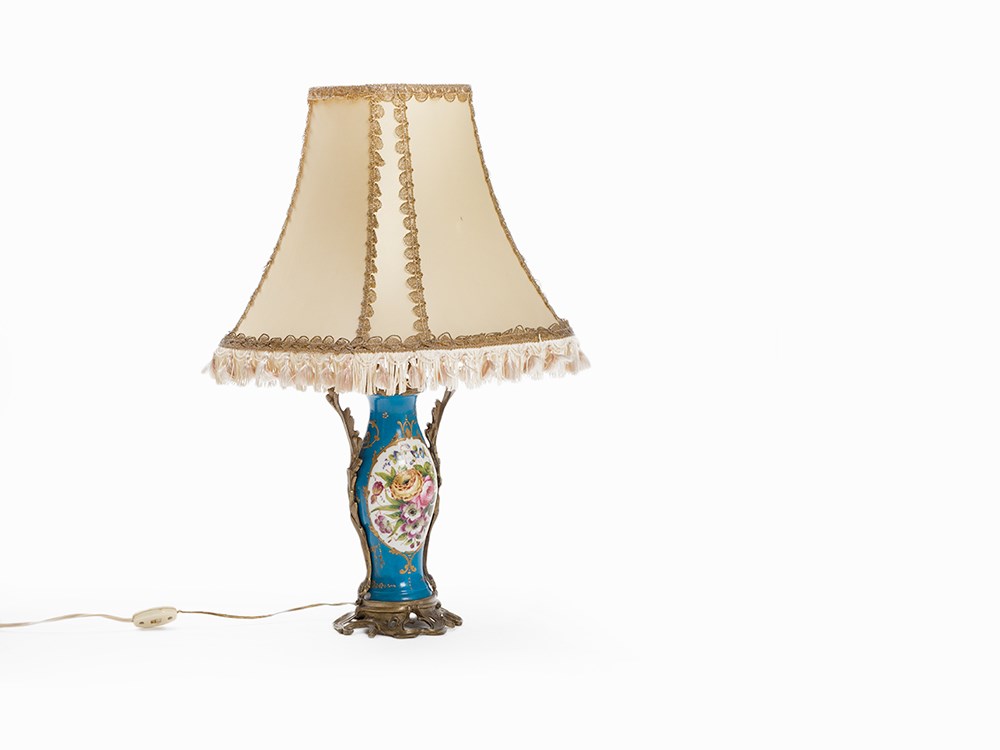 Table Lamp, Porcelain with Bronze Mount, circa 1900 White porcelain with 'Sèvres' blue fond, gold