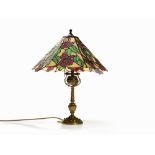 Tiffany Style, Table Lamp, Germany, 19 / 20th C. Brass, synthetics, porcelain, plumbGermany, 19/20th