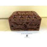 A carved soapstone box approx 100 mm by