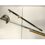 A Wilkinson Sword and scabbard 805 mm. T