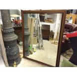 A large bevel edged mirror 1330 mm by 10