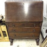 An three draw bureau.