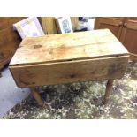 A very characterfull drop leaf pine table with drawer. 960 mm 970 mm