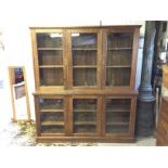 A large oak bookcase / display case with