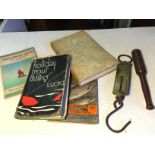 A selection of fishing books a priest and Salter's weighing scale.24